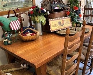Harvest table; ladder-back chairs