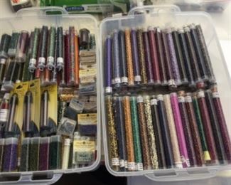 Tubes of seed beads, one of many trays full, at least three deep