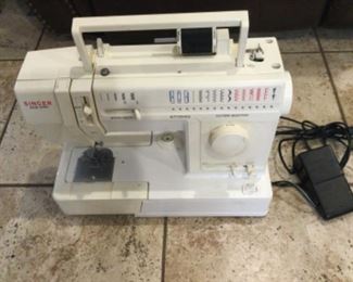 Singer solid state sewing machine with foot pedal, good sturdy model