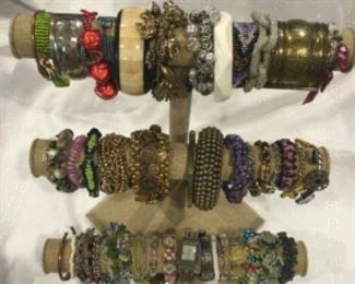 Bracelets, hand made beaded to cha cha charms galore