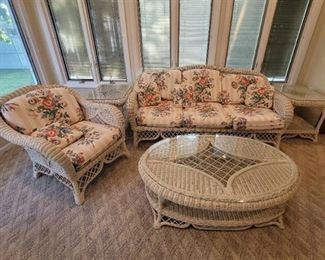5 Piece White Wicker Furniture Set with Cushions. Set Includes Sofa, Chair, Coffee Table, and 2 End Tables. Very Nice and Sturdy Set!
