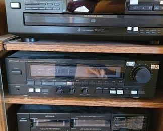 Stereo Cabinet with Contents - Sony Disk Exchange, Optimus Digital Synthesized AM/FM Receiver, and Optimus Cassette Player