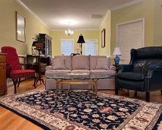 Handknotted rugs, Hancock & Moore leather recliner 