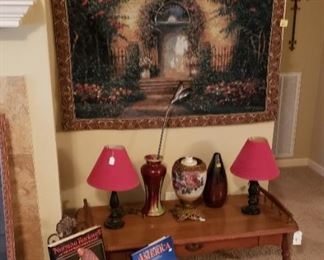 Tapestry, lamps, books, vintage coffee table