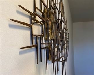 Side view of wall sculpture.