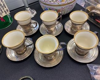 Detail of sterling demitasse cups.
