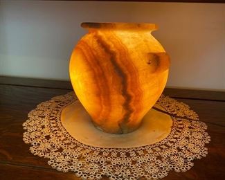 Lighted alabaster urn.
