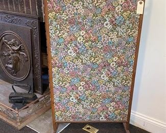 Woven fireplace screen.