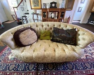 Victorian tufted settee.