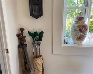 Vintage golf clubs and bags.