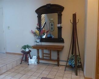 Entrance table, antique mirror, coat rack, piano stool