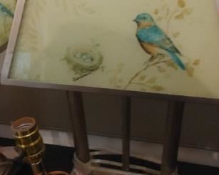 One of my favorite items a pair of paneled  glass blue birds & blue jay  lamps