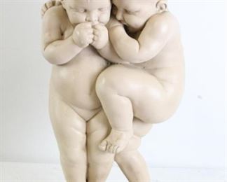 Plaster statue of two children, 
21" x 11".