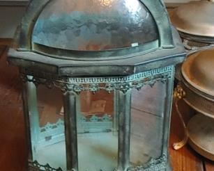 Antique Green Metal Lantern will exude a soft glow when used with a flameless LED candle. Full of old-world charm, it features a brushed antique green and black metal finish with glass. Intricate details add a unique, sophisticated touch. The lantern also features a shapely handle and a hinged side door for quick and easy decorating! Set it out by itself, or fill it with your choice of smaller decor.
Dimensions:
Length: 7 1/4"
Width: 10 5/8"
Height: 23 1/4"
