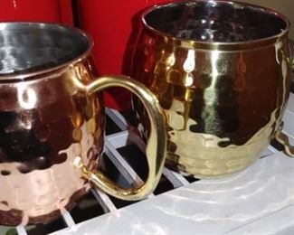 Hand hammered copper and brass mugs