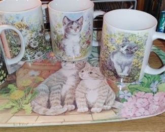 Vintage set of 4 porcelain cups of cats different image of cats on them other side with matching tray. Unbranded however very collectible & hard to find 