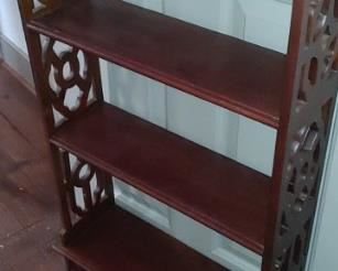 Ornate carved book shelf 