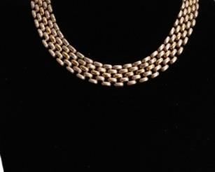 Sterling silver and 14 karat gold necklace