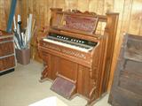Antique pump pipe organ