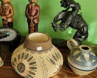 Native American pottery and remington statues