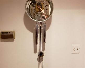 Howard Miller Contemporary Chrome and glass chiming wall clock
$950