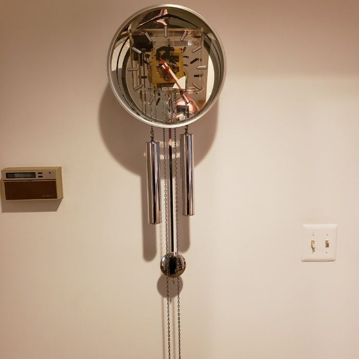 Howard Miller Contemporary Chrome and glass chiming wall clock
$950