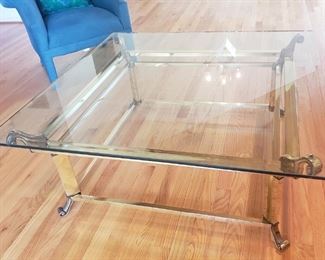 High end glass and Brass Coffee table $350 represents over 50% off sale
Markdown $300 now.  Originally $1250