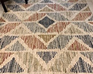 This area rug gives a very nice pop of color
