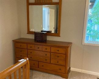 #29 $240. Dresser and mirror sold together.  Dresser is 66"w x 17.5"d x 34"h.  Mirror is 44"w x 45"h