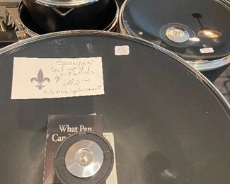$280. Scan pan set of 4 pans with lids, lifetime replacement