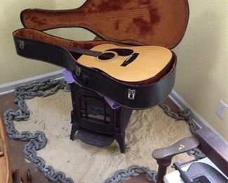 acoustic guitar and 20 foot anchor chain