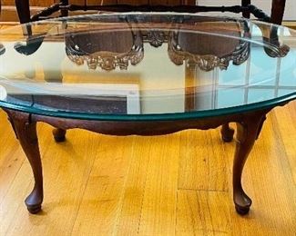 $60
Glass top mahogany coffee table oval 16Tx43Lx29