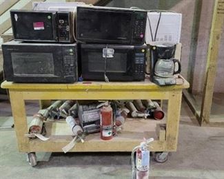 Contents of Cart ( 10 Microwaves - 15 Fire Hydrants)
