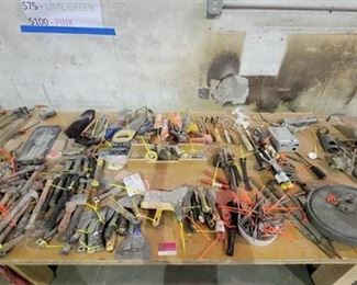 Contents of Table - Tools, Tape Measures, Hand Saws, Caulk Guns and More!!