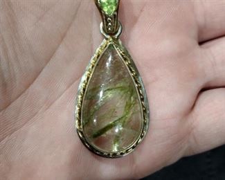 large charm with peridot. 