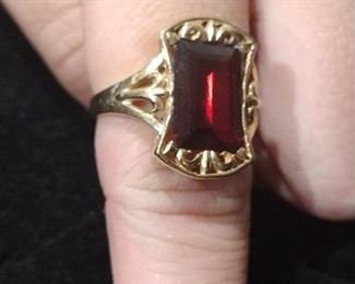 14k gold ring and ruby or garnet 