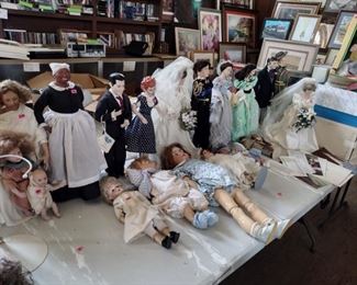 large collection of porcelain dolls 