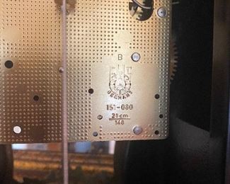 Movement inside the clock in the first picture.