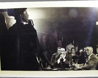 2512   2017 Herman Leonard Silver Gelatin Photo from orig. negative. Herman Leonard (American Photographer, 1923-2010), “Ella Fitzgerald with Duke Ellington, Benny Goodman & Richard Rogers, NYC, 1949”. Custom Gallery Mount with Acrylic coating on a wooden panel. Label on back from “Robert Mann Gallery” in NY. Sold after 2017 Exhibit “The Rhythm’s of Old New York”. 39” X 26” X 2” deep. Cond: No Damage.