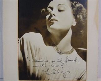 2521   C/1930’s Jean Arthur (American Actress, 1900-1991) autographed photograph, 7” x 9” h. (sight) inscribed “To Geraldine, an old friend, from an old friend, Gladys” (born Gladys Georginna Greene) within a mat 10” x 13” h. Cond: Good overall cond.