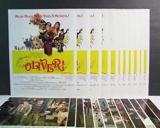 2538   11 1968 “Oliver” Lobby Card Movie Posters with a complete set of 8 X 10 color movie stills in glassine envelope.  Cond: All near mint.