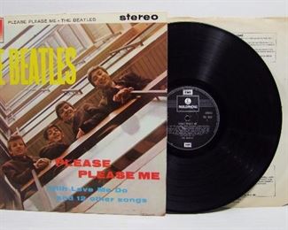 2542   Parlophone PCS 3042 (LP), March 22, 1963, Stereo, “Please, Please, Me”, The Beatles, Mono.  Cond: Record shows light play, Cover spine has some wear at top edge/corner, Minor wear to the back, Overall: 8.5 Rating.