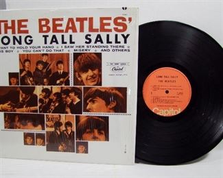 2546*   Capitol T6063 (Capitol Records of Canada), May 11, 1964, “Long Tall Sally”, Monophonic, has orig. Mylar sleeve but missing record sleeve. Cond: Record appears un-played. Album spine has no wear, very minor corner bumps.  Overall: 9 Rating.