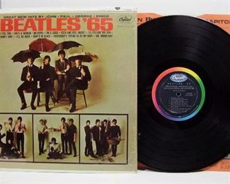2549*   Capitol ST 2228 (LP), Dec. 15, 1964, “Beatles 65”, Monophonic, has orig. Mylar sleeve. Cond: Record shows very light play, cover spine near mint, slight wear at the opening.  Overall: 9 Rating.