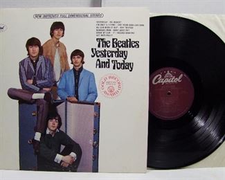 2561   Capitol 2553 (LP) June 20, 1966, “Yesterday…and Today”, stereo.  Cond: Record very lightly played, Cover spine has tiny rub on the ending letters of the word “Beatles”, All 4 corners have minor bumps, Cover shine at 98%.  Overall: 9 Rating.