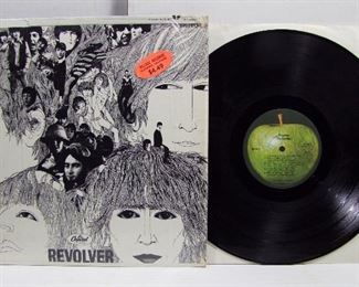 2562*   Capitol ST 2576 (LP), Aug. 8, 1966 “Revolver”, stereo. Has the orig. Mylar sleeve with Record store price tag. Cond: Record lightly played, Cover spine has multiple tiny angled creases, all 4 corners have light bumps, the record opening has minor wear. Overall: 8.5 Rating.