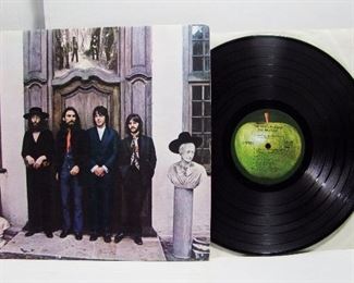 2570   Apple SW 385/SO (LP), Feb. 26, 1970, “Hey Jude” (AKA The Beatles Again) Stereo.  Cond: Record shows very light play, record sleeve has multiple tears, Cover spine has 6 sm. creases with all 4 corners showing light wear, Cover shine approx.. 98% with back at 95%, very minor wear at the cover opening. Overall 8.5 Rating.