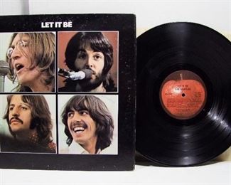 2571   Apple AR 34001 (LP), May 18, 1970 “Let It Be”, Stereo. Cond: Record shows light Play, Cover spine has very light rubs & 2 sm. creases, All 4 corners have light wear, Cover shine approx. 96% with back at 90%, Both cover & record lightly inscribed with owners name. Overall: 8 Rating.
