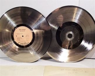 2574   Pair of Original metal record master pressing dies for Bob Seger “Traveling Man” LP, dated 1976, includes “Traveling Man, Beautiful Loser and Jody Girl” (on side 1), both measure 12” dia. Cond: No damage found.
