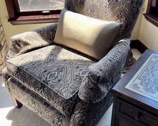 This chair has an awesome look with the unique designer fabric and very cool side table.